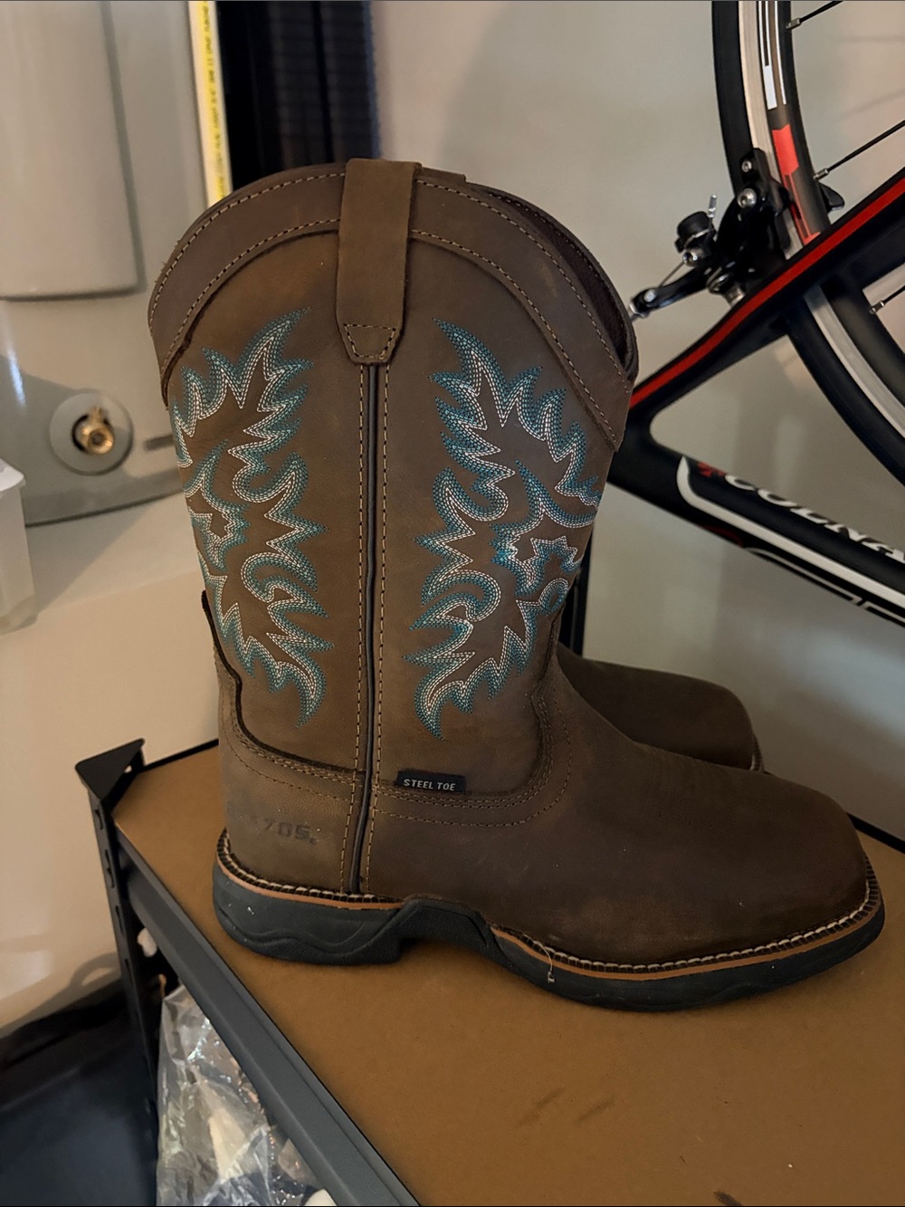 Women’s Brown Western Heeled Boots with Turquoise Stitching.